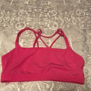 Pink colored athletic top